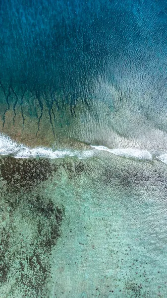 Aerial view clear turquoise ocean, Mauritius