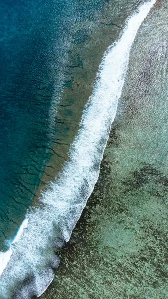 Aerial view waves breaking over, Mauritius