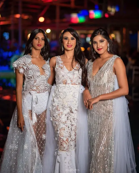 Three women elegant evening gowns, Mauritius