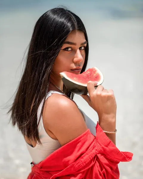 Close up woman eating watermelon, Mauritius