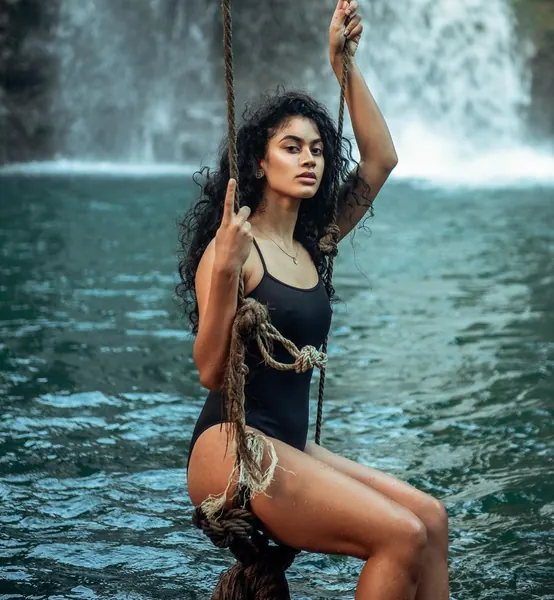 Close up woman sitting rope, Mauritius