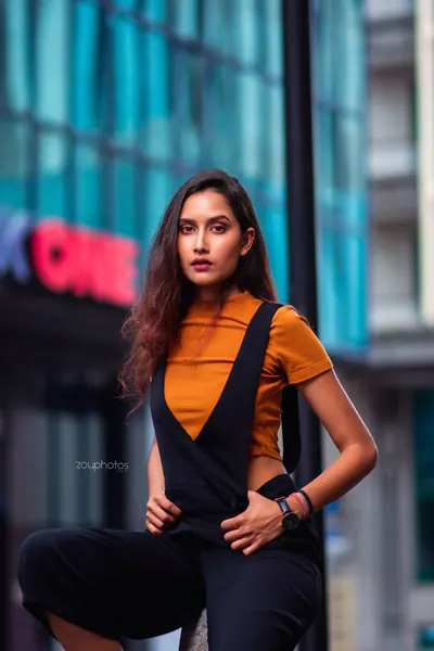 Stylish woman orange turtleneck overalls, Mauritius